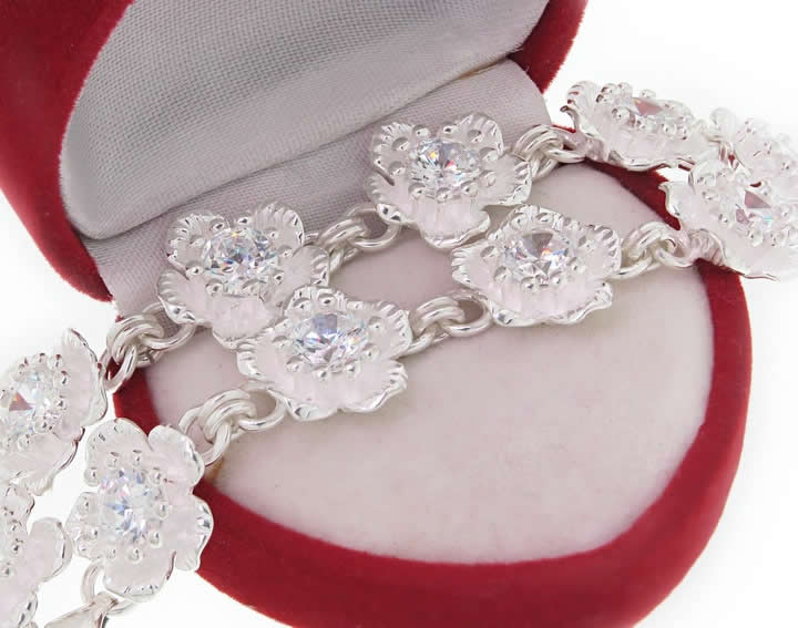 Ozdobna kwiecista bransoleta z białymi cyrkoniami