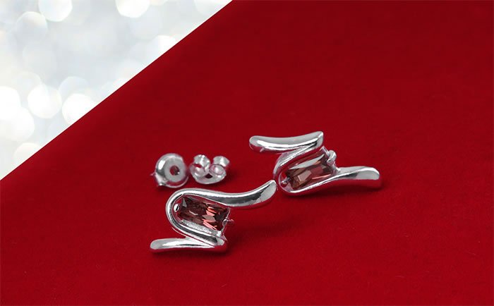 Kolczyki asymetryczne z cyrkonią