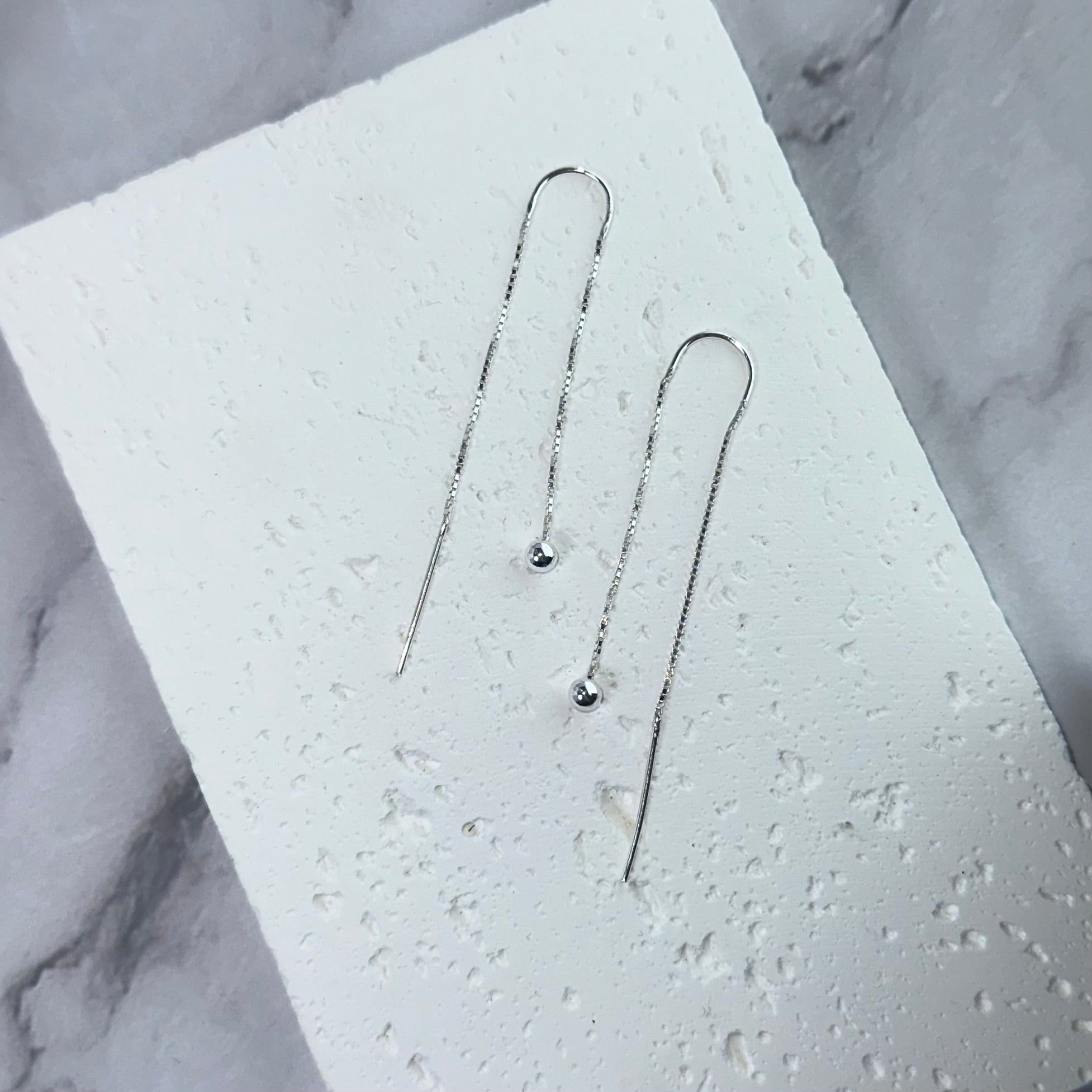 Przekładane kolczyki podwójne kuleczki