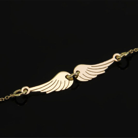 Złota bransoletka skrzydła anioła 333